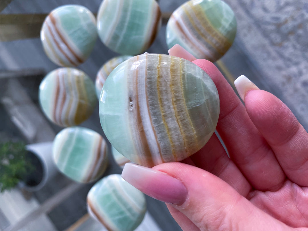 Pistachio Calcite Coin with Burnt Orange Stripe