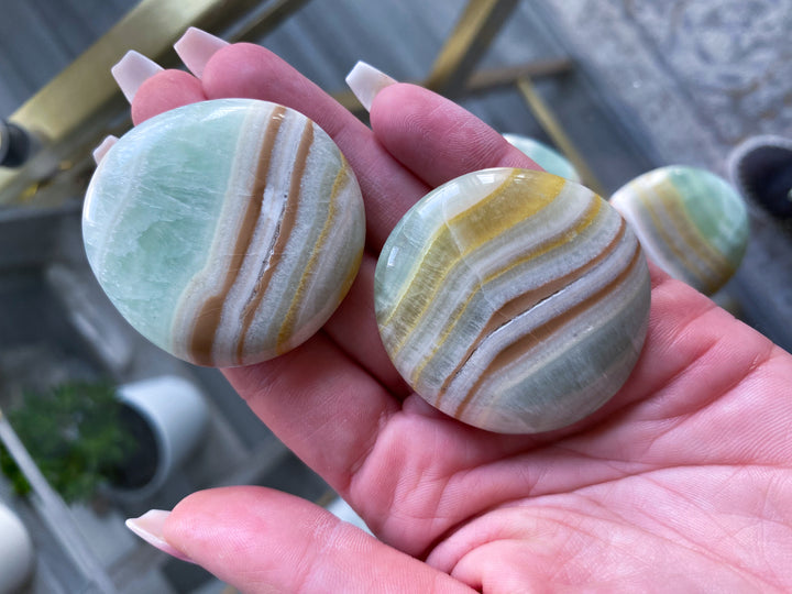 Pistachio Calcite Coin with Burnt Orange Stripe