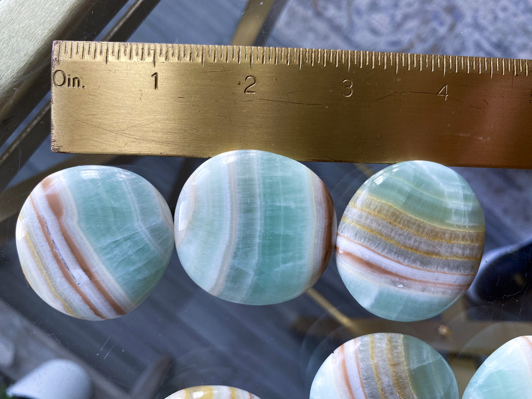 Pistachio Calcite Coin with Burnt Orange Stripe