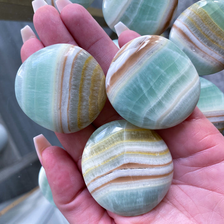 Pistachio Calcite Coin with Burnt Orange Stripe