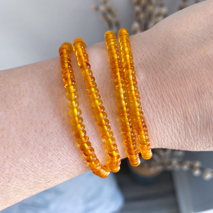 Manifestation: Beaded Cylinder Amber Stretch Bracelet