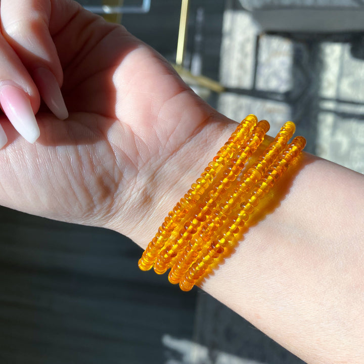 Manifestation: Beaded Cylinder Amber Stretch Bracelet