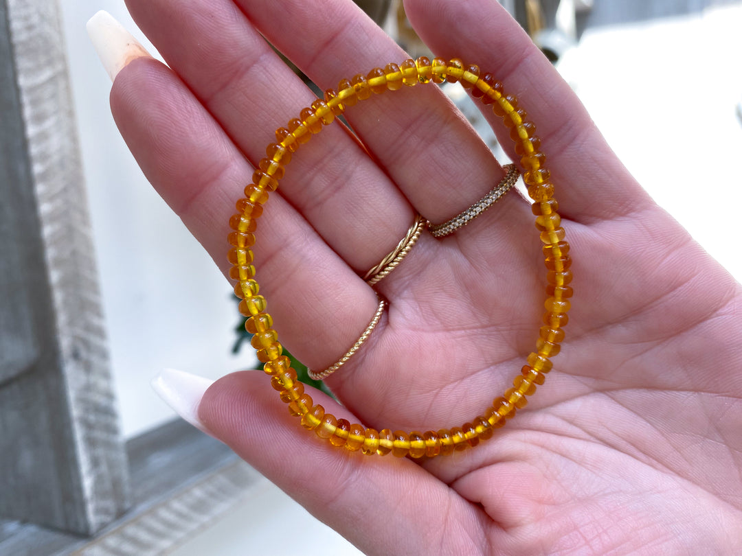 Manifestation: Beaded Cylinder Amber Stretch Bracelet