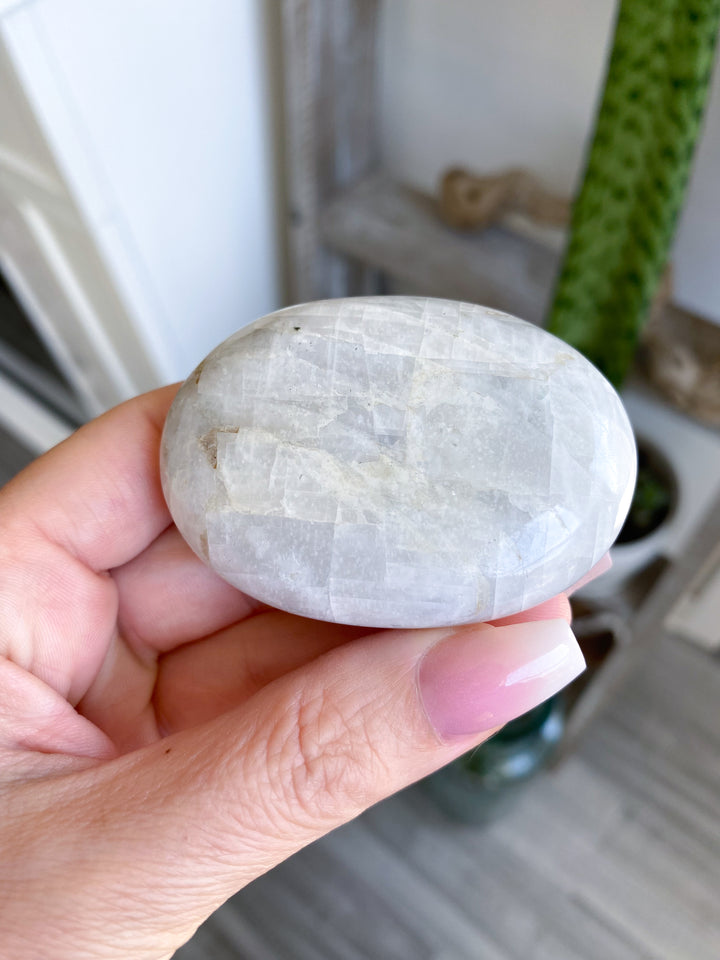 White, Egg-like Rainbow Moonstone Palm #1