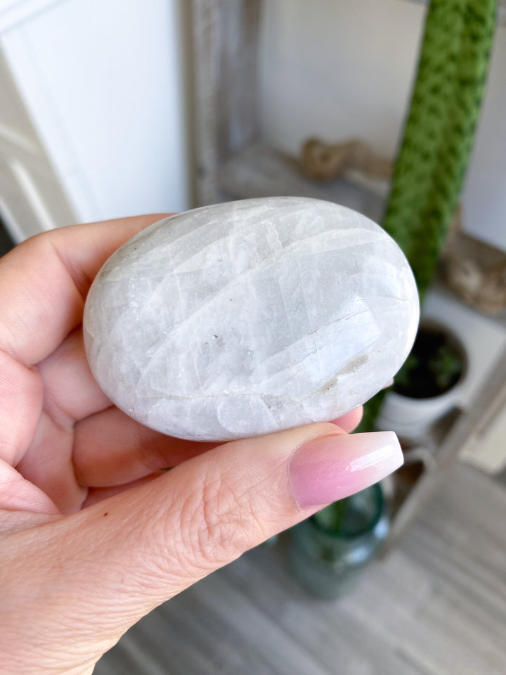 White, Egg-like Rainbow Moonstone Palm #1