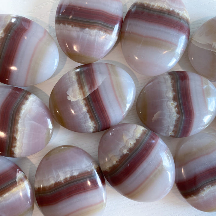 Banded Pink Oynx Palm Stone