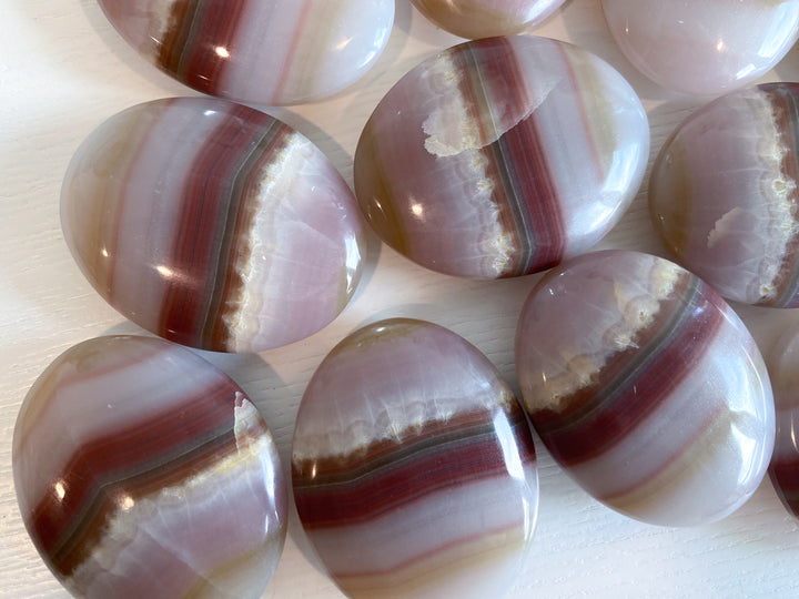 Banded Pink Oynx Palm Stone