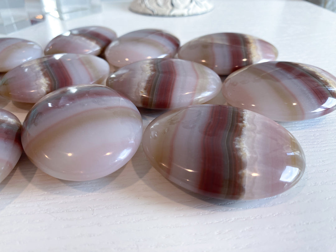 Banded Pink Oynx Palm Stone