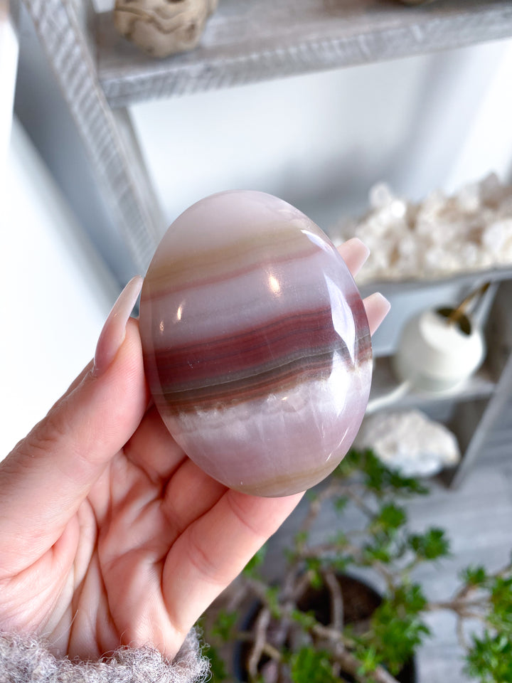 Banded Pink Oynx Palm Stone