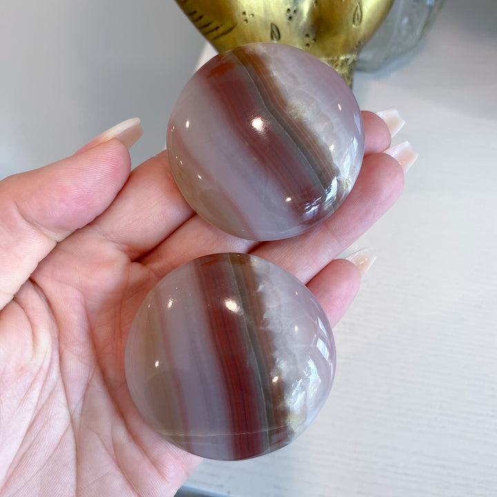 Large Banded Pink Onyx Coin