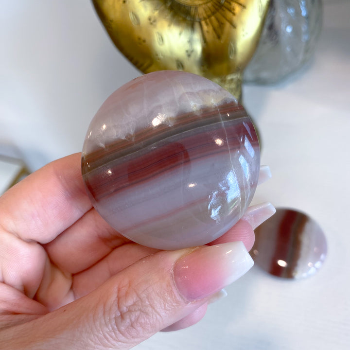 Large Banded Pink Onyx Coin