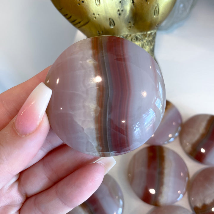 Large Banded Pink Onyx Coin
