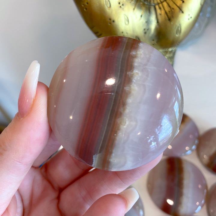Large Banded Pink Onyx Coin