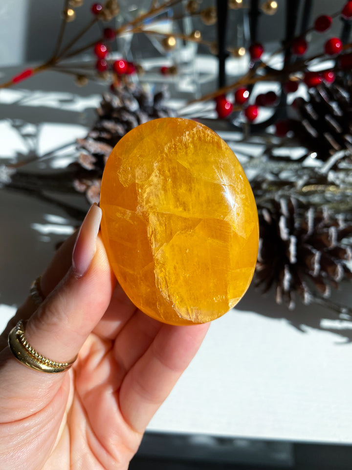 Bright, Juicy Orange Calcite Palm Stone