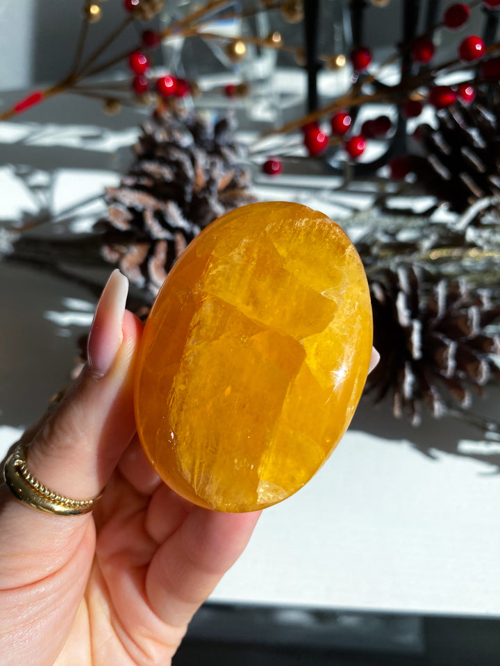 Bright, Juicy Orange Calcite Palm Stone