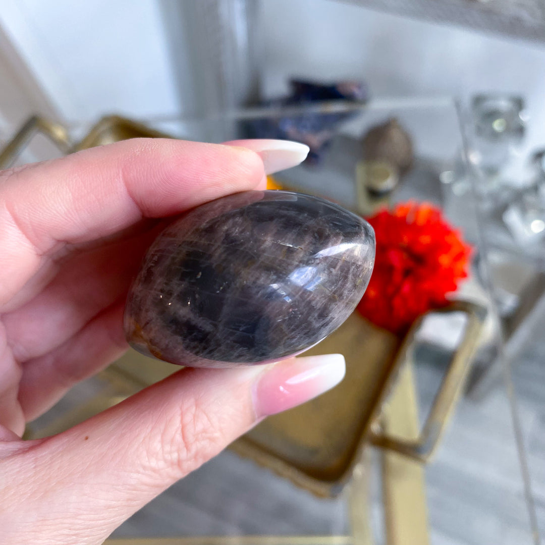 Circular Black Moonstone Palm Stone w/ Sheen 