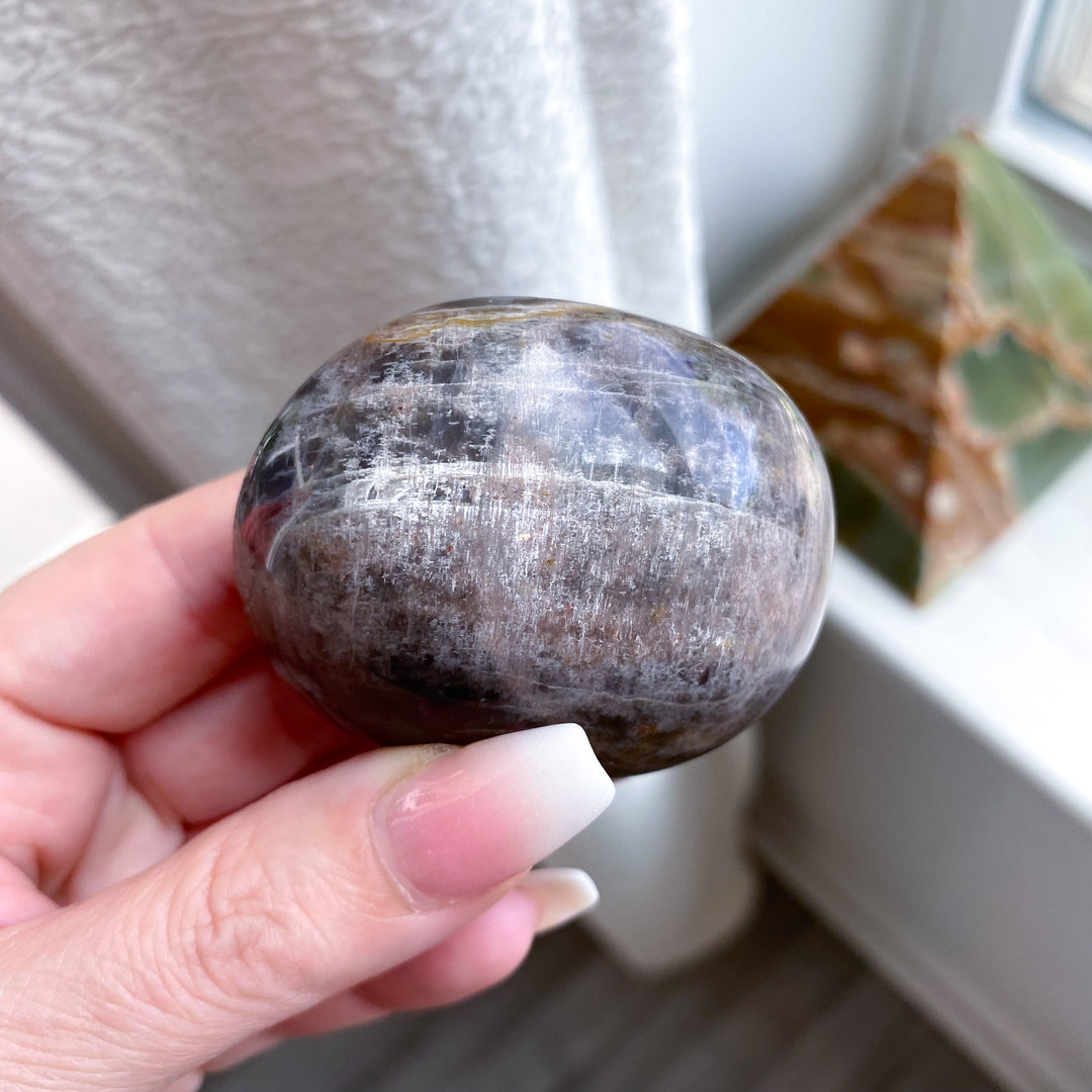 Circular Black Moonstone Palm Stone w/ Sheen 