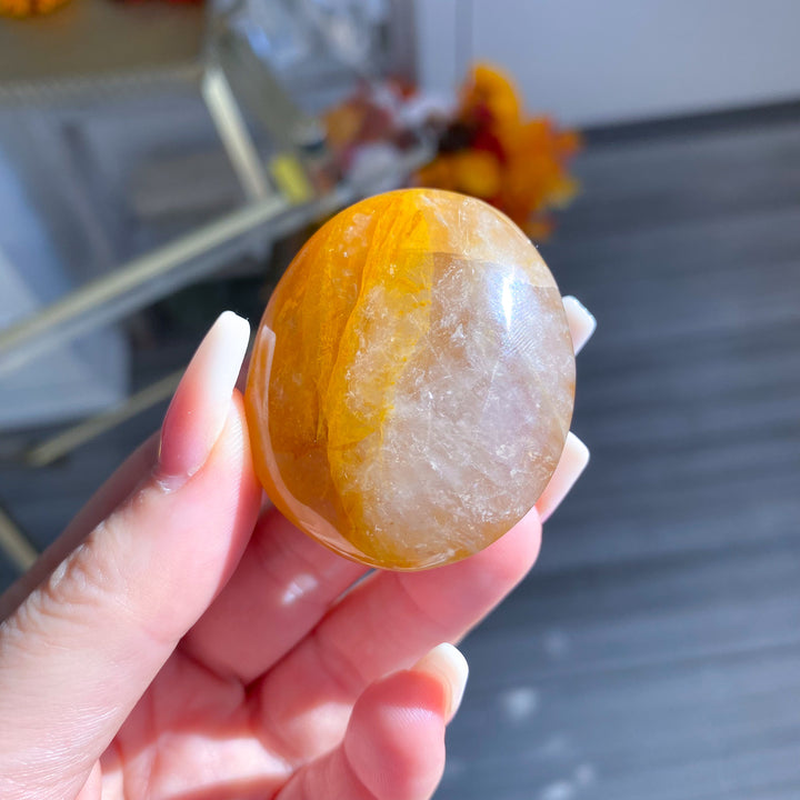 Golden Healer Quartz Pebble Palm 
