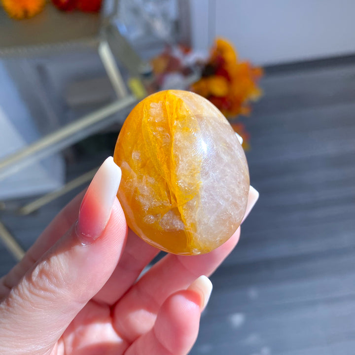 Golden Healer Quartz Pebble Palm 