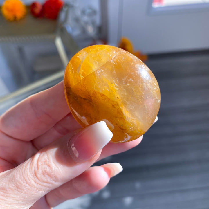 Golden Healer Quartz Pebble Palm 