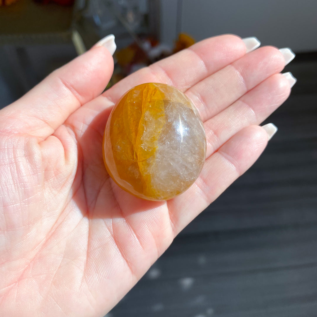 Golden Healer Quartz Pebble Palm 