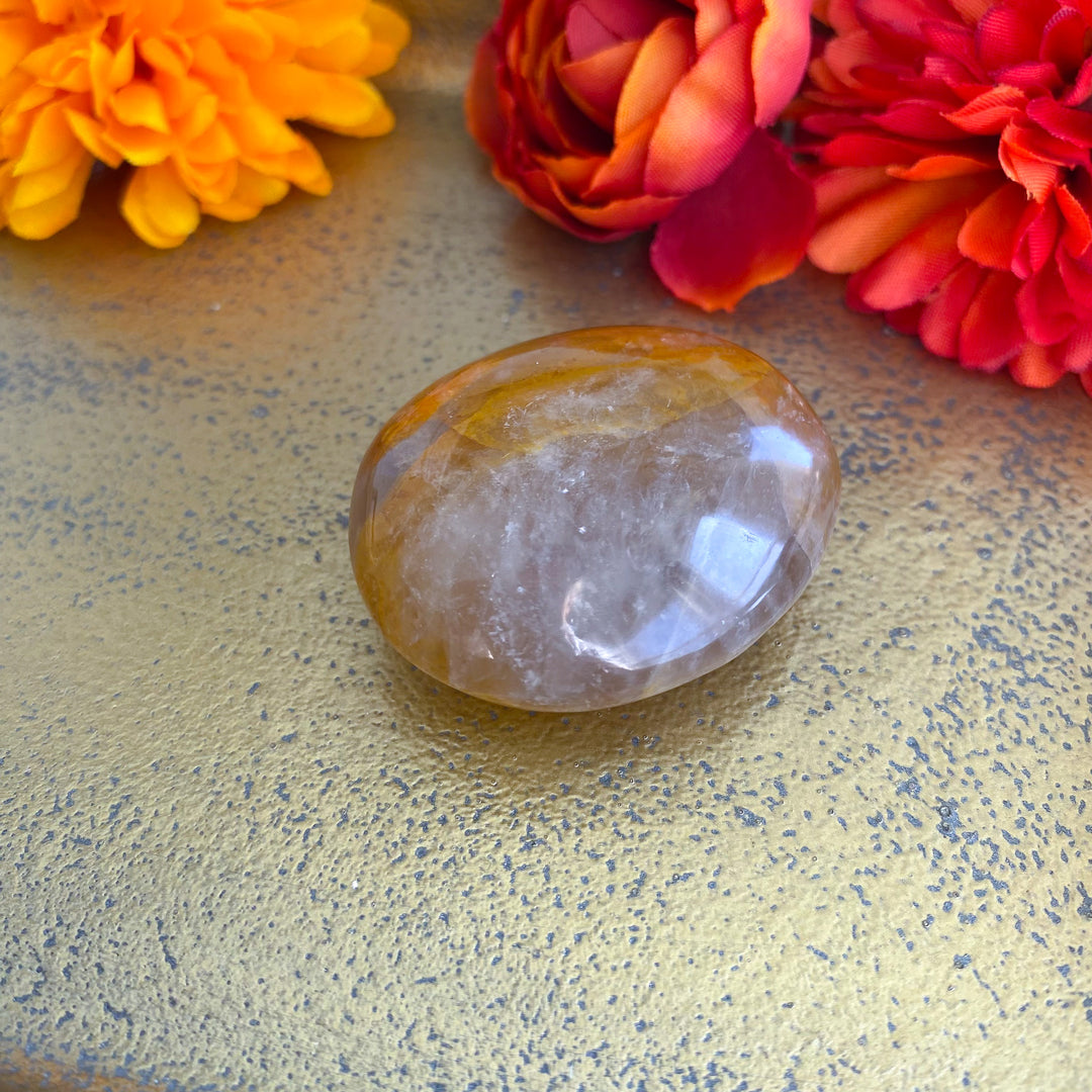 Golden Healer Quartz Pebble Palm 