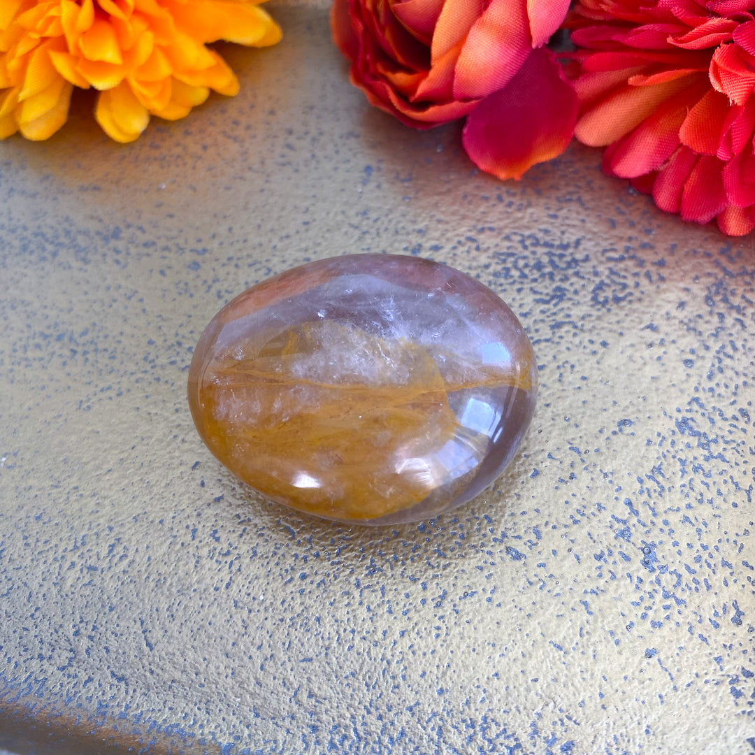 Golden Healer Quartz Pebble Palm 