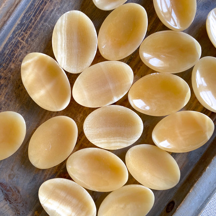 Shiny, Sherbert Orange Calcite Worry Stone