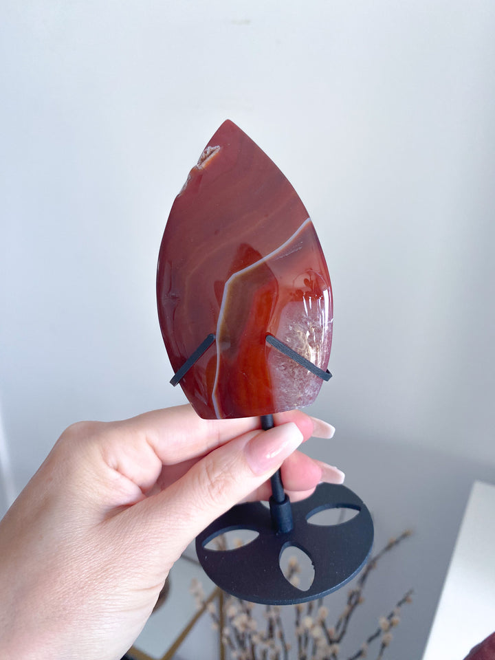 Shiny Carnelian Flame on Black Stand