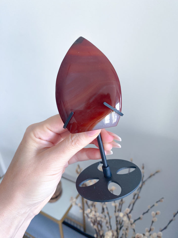 Shiny Carnelian Flame on Black Stand