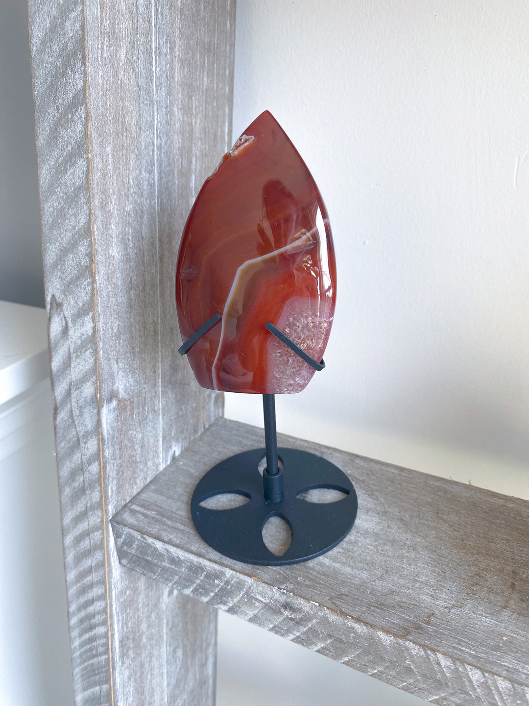 Shiny Carnelian Flame on Black Stand