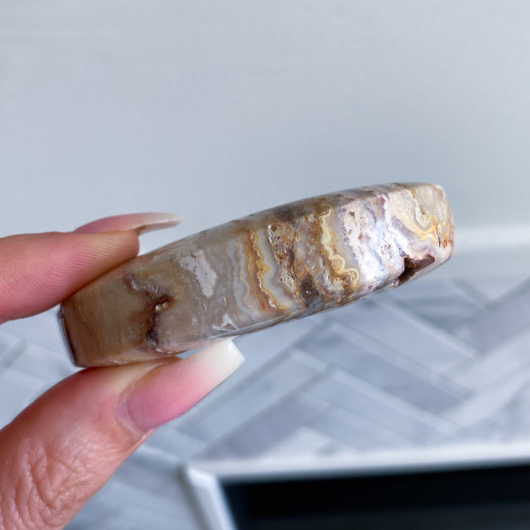 Crazy Lace Agate Moon Carving