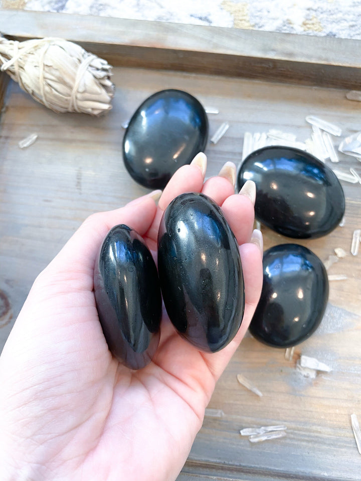 Black Tourmaline Palm Stone: Protection, Grounding